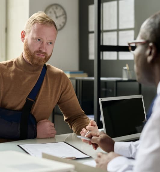 Medical Malpractice Lawyers 22 medical professional speaking with patient